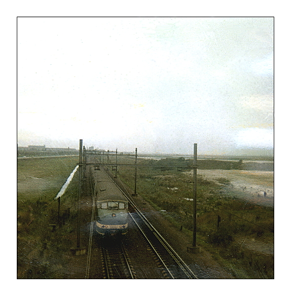 Sloterdijk, spoorweg 1973 Spoorlijn Amsterdam richting Halfweg, gezien vanaf het viaduct van de Einsteinweg. 